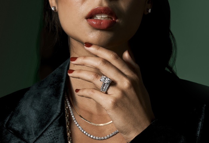 woman wearing bracelet and earrings